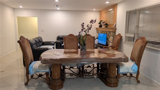 Living and dining area with fireplace